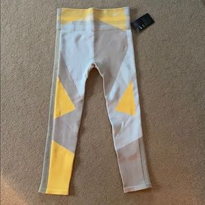 New with Tags yellow patterned Nike Leggings
